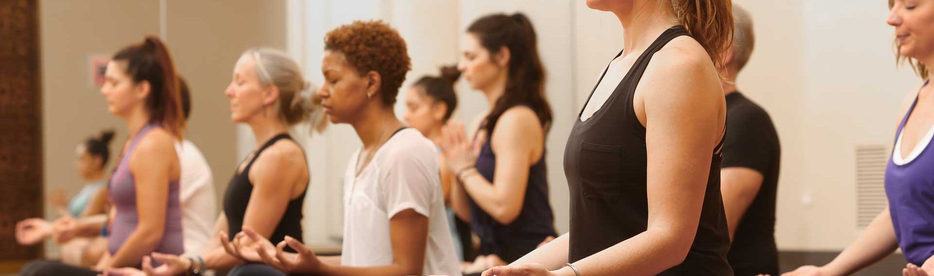 Yoga class in a meditative pose